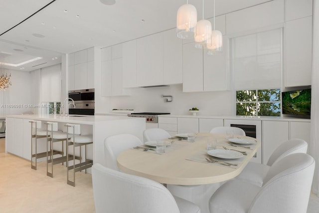 dining area featuring sink