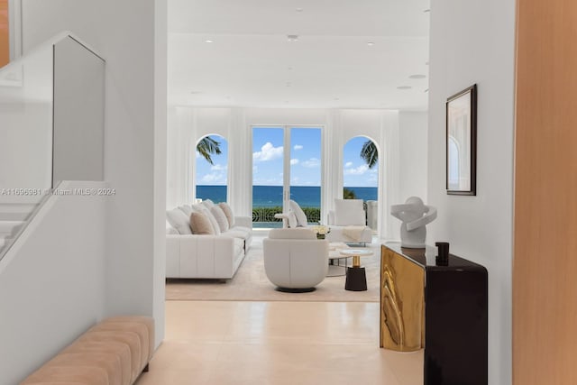 living room featuring a water view