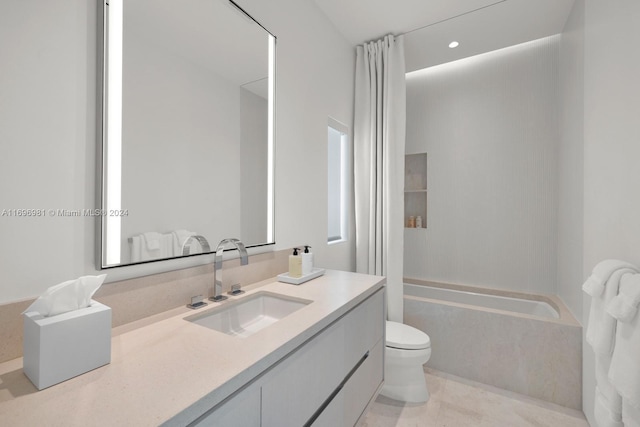 bathroom featuring a washtub, tile patterned floors, vanity, and toilet