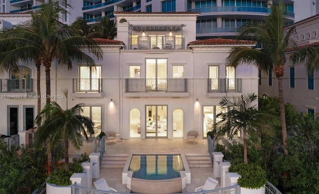 rear view of house with french doors