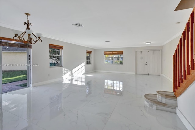 interior space featuring crown molding and a chandelier