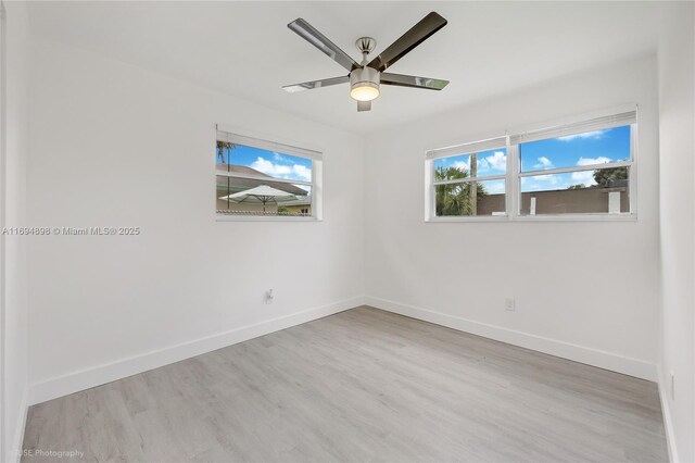 unfurnished bedroom featuring a closet, light hardwood / wood-style flooring, and ceiling fan