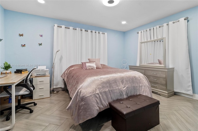 bedroom featuring light parquet floors