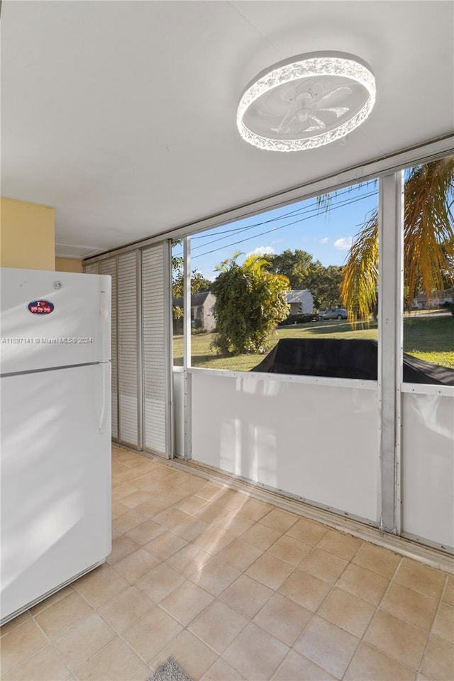 interior space featuring light tile patterned flooring