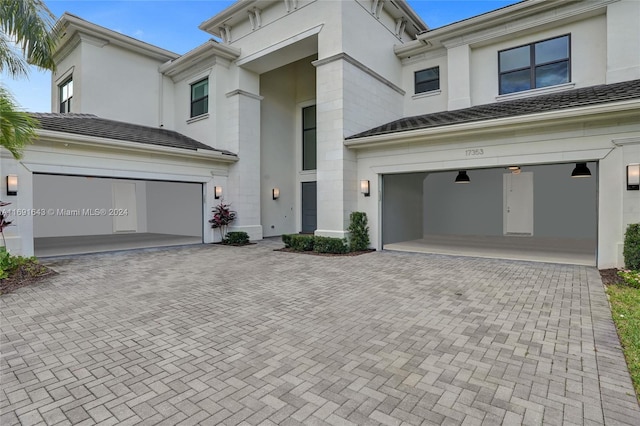 view of front of property with a garage