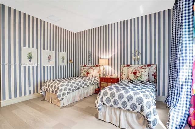 bedroom featuring light hardwood / wood-style flooring