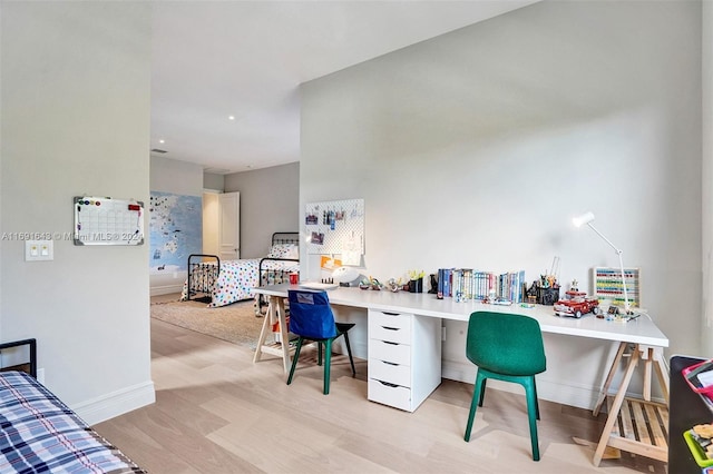 home office with light wood-type flooring