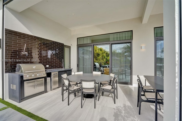 view of patio / terrace with an outdoor kitchen and grilling area