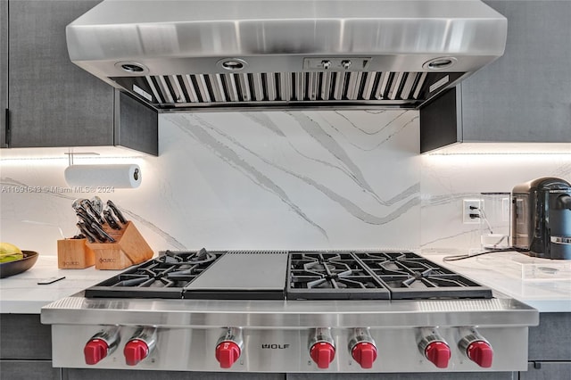 kitchen with stainless steel gas cooktop and ventilation hood