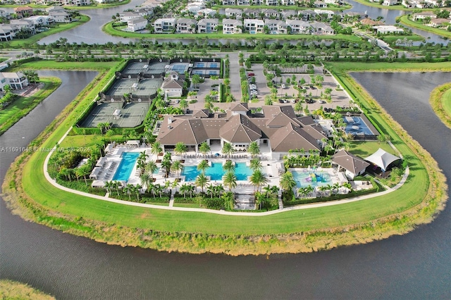 birds eye view of property featuring a water view