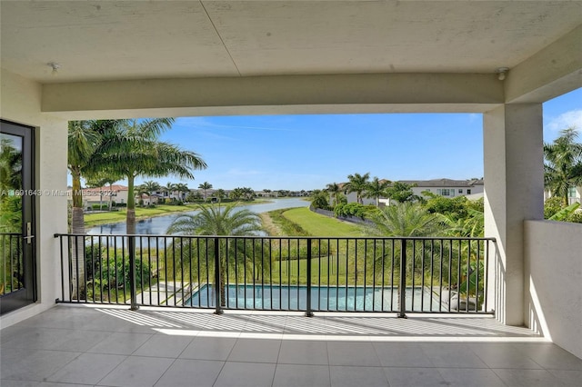 balcony featuring a water view