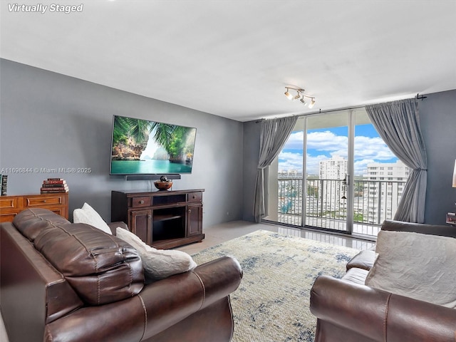 living room with a wall of windows