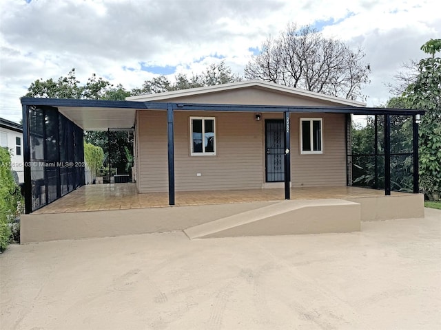 view of front facade featuring a carport