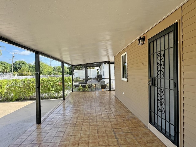 view of unfurnished sunroom