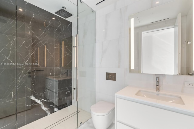 bathroom featuring vanity, toilet, tiled shower, and tile walls