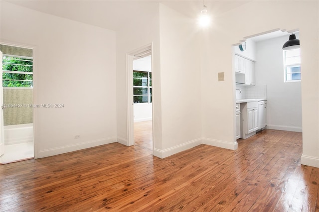 empty room with light wood-type flooring