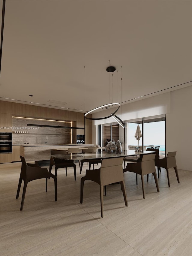 dining area featuring light wood-type flooring