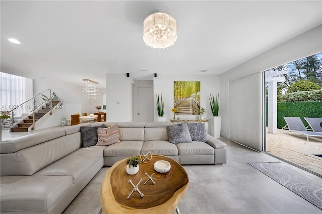 living room with a notable chandelier