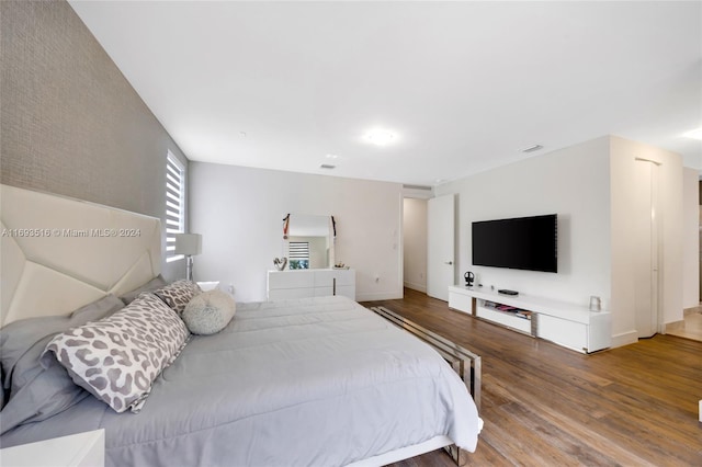 bedroom featuring wood-type flooring