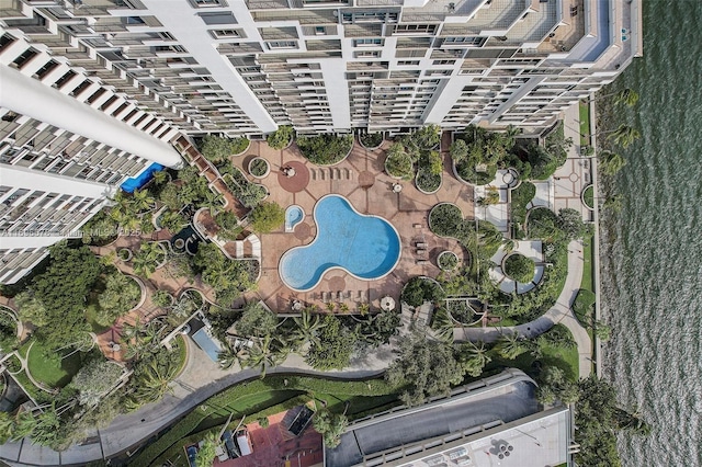 birds eye view of property featuring a water view