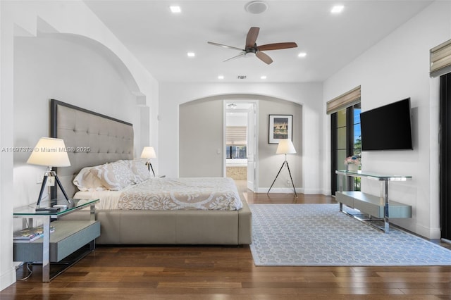 bedroom with dark hardwood / wood-style flooring