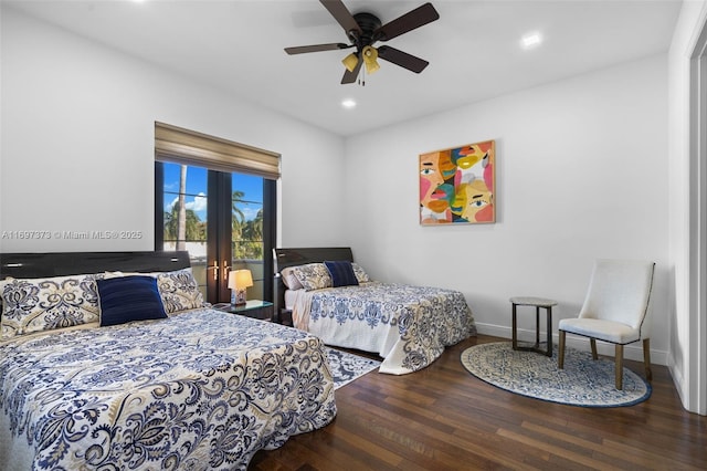 bedroom with hardwood / wood-style flooring and ceiling fan