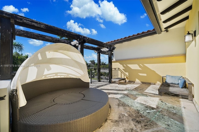 view of patio featuring a pergola