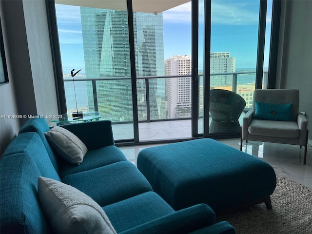 1300 S Miami Ave Unit 2104, Miami, FL 33130 - living area featuring a city view, marble tiled flooring, and floor to ceiling windows
