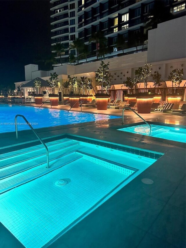 1300 S Miami Ave Unit 2104, Miami, FL 33130 - pool at twilight featuring a community pool