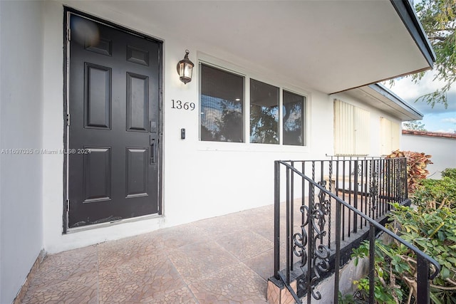 1369 NW 96th St, Miami, FL 33147 - doorway to property with stucco siding
