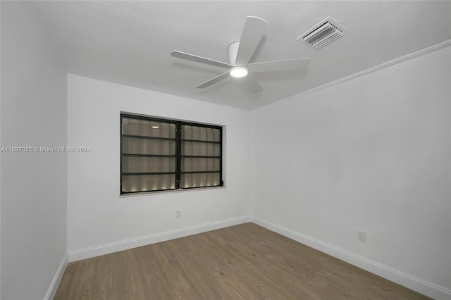 1369 NW 96th St, Miami, FL 33147 - empty room featuring wood finished floors and a ceiling fan