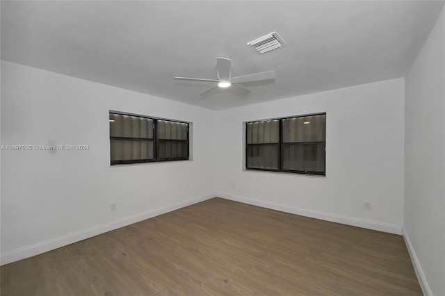 unfurnished room featuring hardwood / wood-style floors and ceiling fan