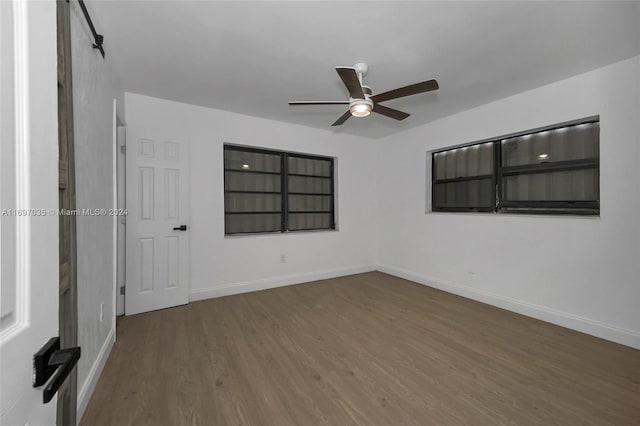 1369 NW 96th St, Miami, FL 33147 - spare room with a ceiling fan and wood finished floors