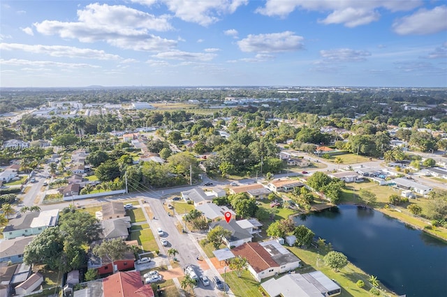 drone / aerial view featuring a water view