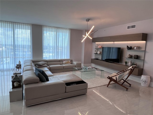 living room featuring a chandelier