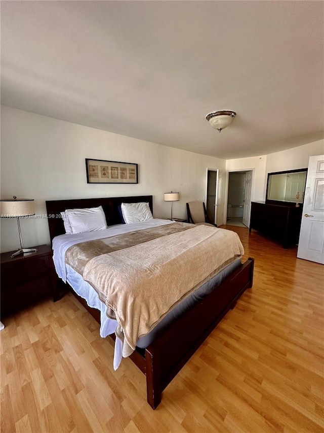 bedroom with light hardwood / wood-style flooring