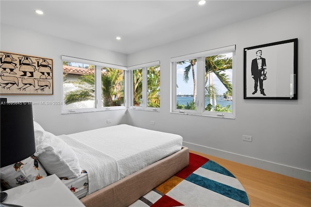 bedroom with light hardwood / wood-style flooring