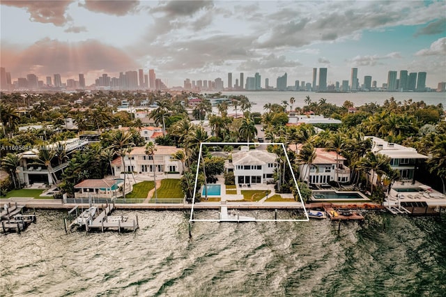 bird's eye view with a water view