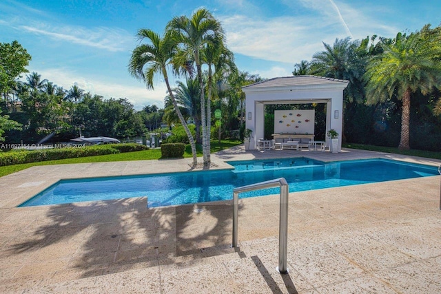 view of pool featuring a patio and an outdoor hangout area