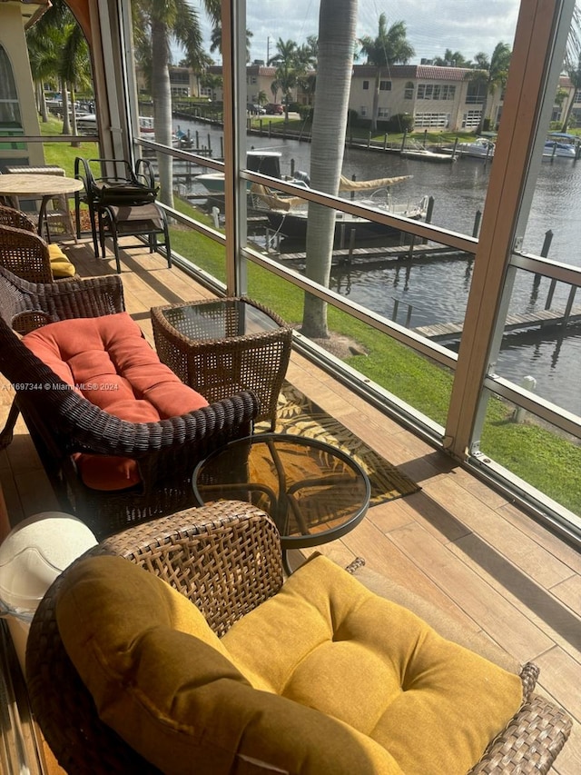 sunroom with a water view