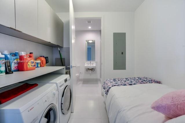 interior space featuring washer and clothes dryer and electric panel