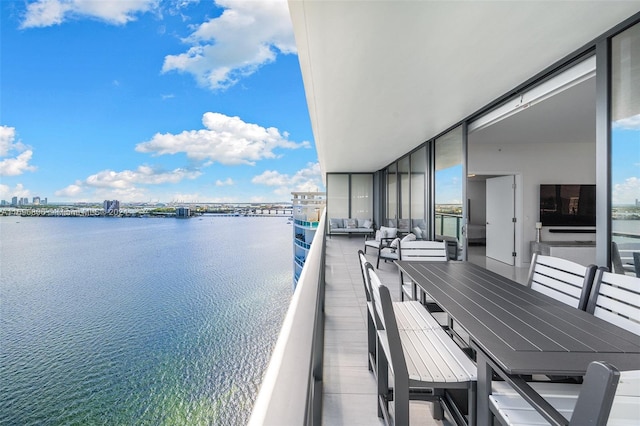 balcony featuring a water view