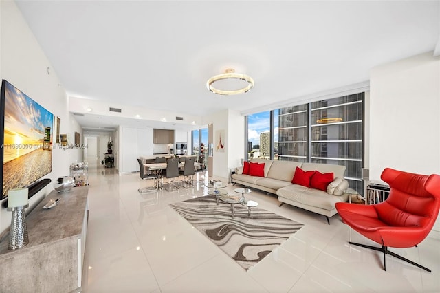 living room featuring light tile patterned flooring