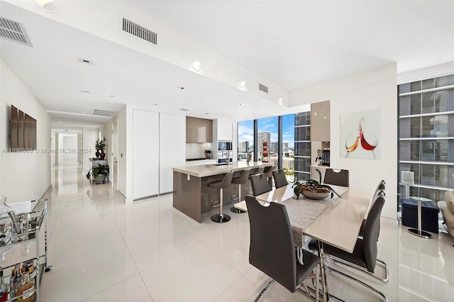 788 NE 23rd St Unit 2102, Miami, FL 33137 - dining area featuring light tile patterned flooring and a view of city