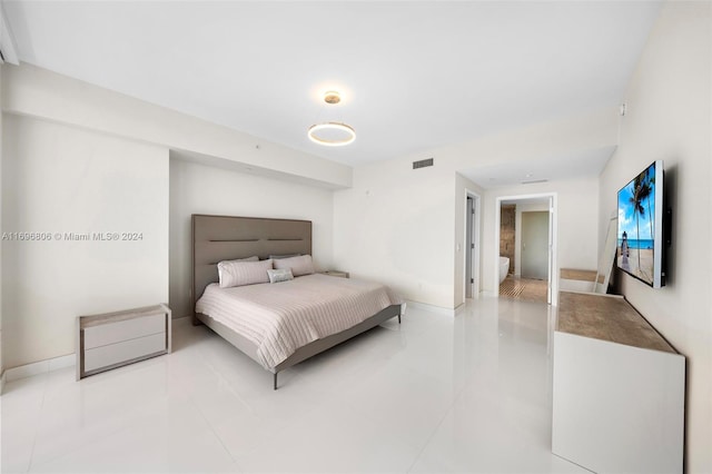 bedroom featuring tile patterned floors