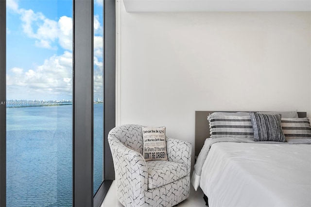 bedroom with a water view