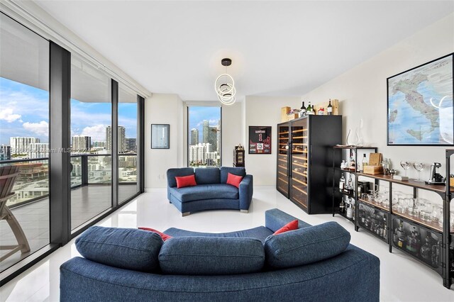788 NE 23rd St Unit 2102, Miami, FL 33137 - living room with a wall of windows, a city view, and tile patterned floors