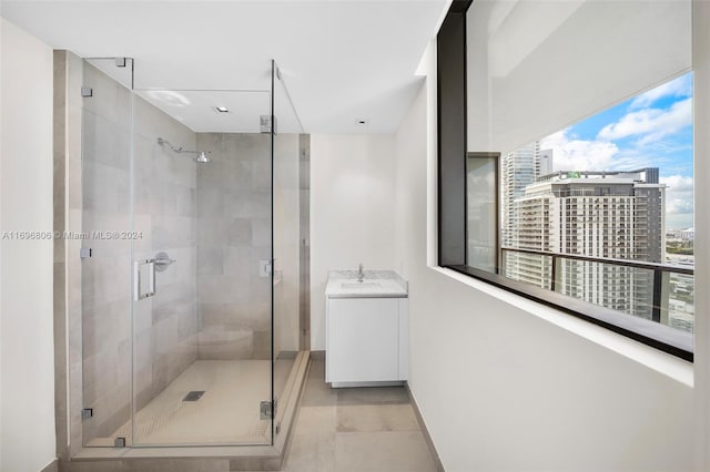 bathroom featuring vanity and walk in shower