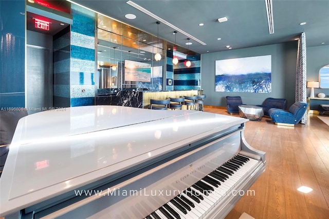 miscellaneous room featuring hardwood / wood-style floors