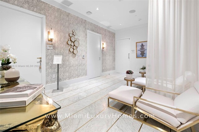 788 NE 23rd St Unit 2102, Miami, FL 33137 - living area with wallpapered walls and recessed lighting
